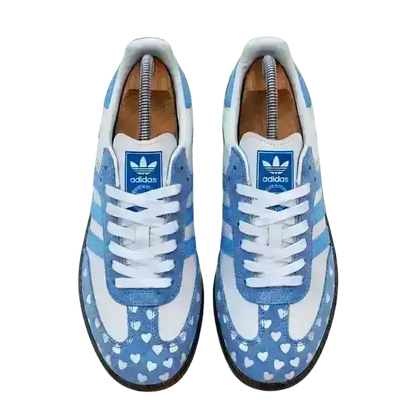 Charming Adidas Samba love heart sneakers with a special blue and white design, perfect for expressing a sweet and trendy fashion sense.