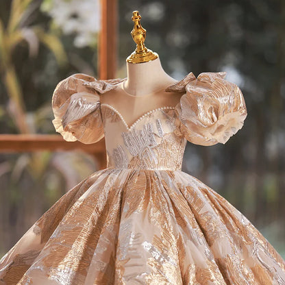 Golden Whispers Ball Gown