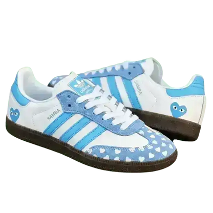 Lifestyle on-feet shot of the Adidas Love Heart 2026 Edition styled with casual streetwear.